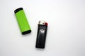 Two lighters on a white background Royalty Free Stock Photo