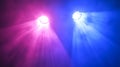 Two lights are shining on a blue and pink background Royalty Free Stock Photo