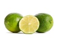 Two limes with half of a juicy lime Royalty Free Stock Photo