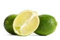 Two limes with half of a juicy lime Royalty Free Stock Photo