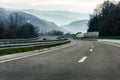 Two line wide highway on a cloudy winter day