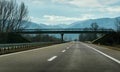 Two line wide highway on a cloudy winter day