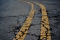 Two lined markings on the cracked road Royalty Free Stock Photo