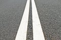 Two lines on asphalt road Royalty Free Stock Photo