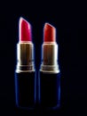 Two lipsticks competing to be stars Royalty Free Stock Photo