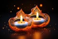 Two lit candles sitting on top of a table. Diwali greeting card. Royalty Free Stock Photo