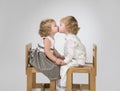 Two little babies kiss Royalty Free Stock Photo