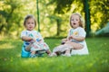 The two little baby girls hanging upside down