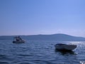 Two little boats on the sea