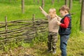 Two little boys celebrating lighting a fire Royalty Free Stock Photo