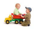 Two little boys play with toy truck Royalty Free Stock Photo