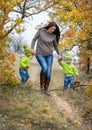 Two little brother and mother on walk