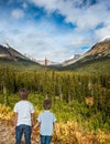 Two little brothers. The grandiose landscape Royalty Free Stock Photo