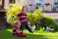 Two little brothers play outdoors