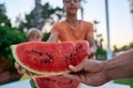 Two little children, boy brothers, eating watermelon in the park, summertime Royalty Free Stock Photo