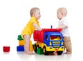 Two little children playing with color toys Royalty Free Stock Photo