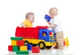 Two little children playing with color toys Royalty Free Stock Photo