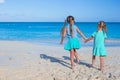 Two little cute girls enjoy their summer vacation on the beach Royalty Free Stock Photo