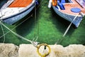 Two Little Floating Boats Tied-Up Royalty Free Stock Photo