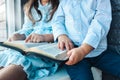 Two Little girl and boy hands folded in prayer on a Holy Bible together for faith concept Royalty Free Stock Photo