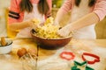 Two little girls chefs crumple the dough Royalty Free Stock Photo