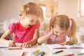 Cute little girls drawing. Close up image. Royalty Free Stock Photo