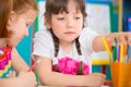 Two little girls drawing at kindergarten Royalty Free Stock Photo