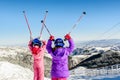 Two little girls enjoying skiing on Kopaonik, Serbia Royalty Free Stock Photo