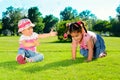 Two little girls on the field Royalty Free Stock Photo