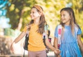 Two little girls going to school together Royalty Free Stock Photo