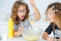 Two little girls having fun baking Royalty Free Stock Photo