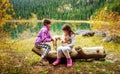 Two little girls hiking on Black Lake ( Crno jezero),Durmitor, M Royalty Free Stock Photo