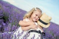 Two little girls hugging on a lavender