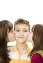 Two little girls kissing boys Royalty Free Stock Photo