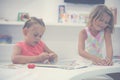 Two little girls playing together in playground. Two sisters the Royalty Free Stock Photo