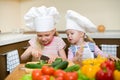 Two little girls preparing healthy food on kitchen Royalty Free Stock Photo