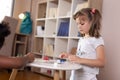 Little girls playing ludo board game Royalty Free Stock Photo