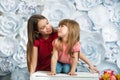 Two little girls smiling and looking at each other Royalty Free Stock Photo