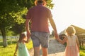 Grandfather walking with his granddaughters on the farm. Royalty Free Stock Photo