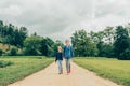 Two little girls walking in fields Royalty Free Stock Photo