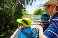 Two little kids boys and father making air boat tour in Everglades Park Royalty Free Stock Photo