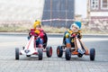 Two little kids boys having fun with toy race cars Royalty Free Stock Photo