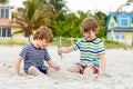 Two little kids boys having fun on tropical beach Royalty Free Stock Photo