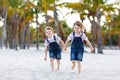 Two little kids boys having fun on tropical beach Royalty Free Stock Photo