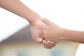 Two little kids holding hands and holding hands walking. The me Royalty Free Stock Photo