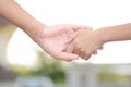 Two little kids holding hands and holding hands walking. The me Royalty Free Stock Photo