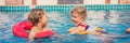 Two little kids playing in the swimming pool BANNER, LONG FORMAT Royalty Free Stock Photo