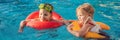 Two little kids playing in the swimming pool BANNER, LONG FORMAT Royalty Free Stock Photo