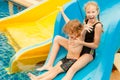 Two little kids playing in the swimming pool Royalty Free Stock Photo