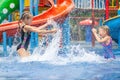 Two little kids playing in the swimming pool Royalty Free Stock Photo